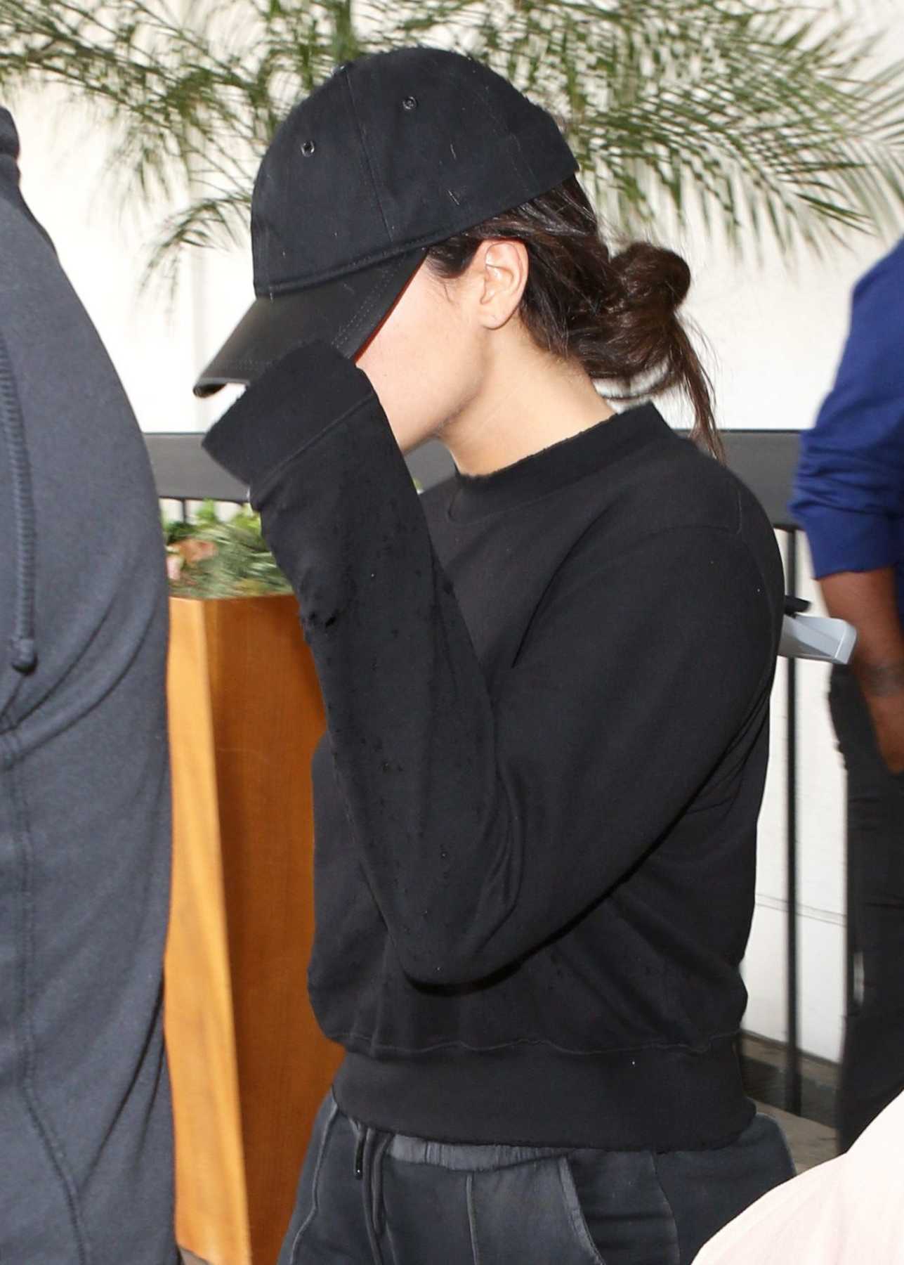 Arriving_at_LAX_Airport_With_Black_Outfit_-_July_24-02.jpg